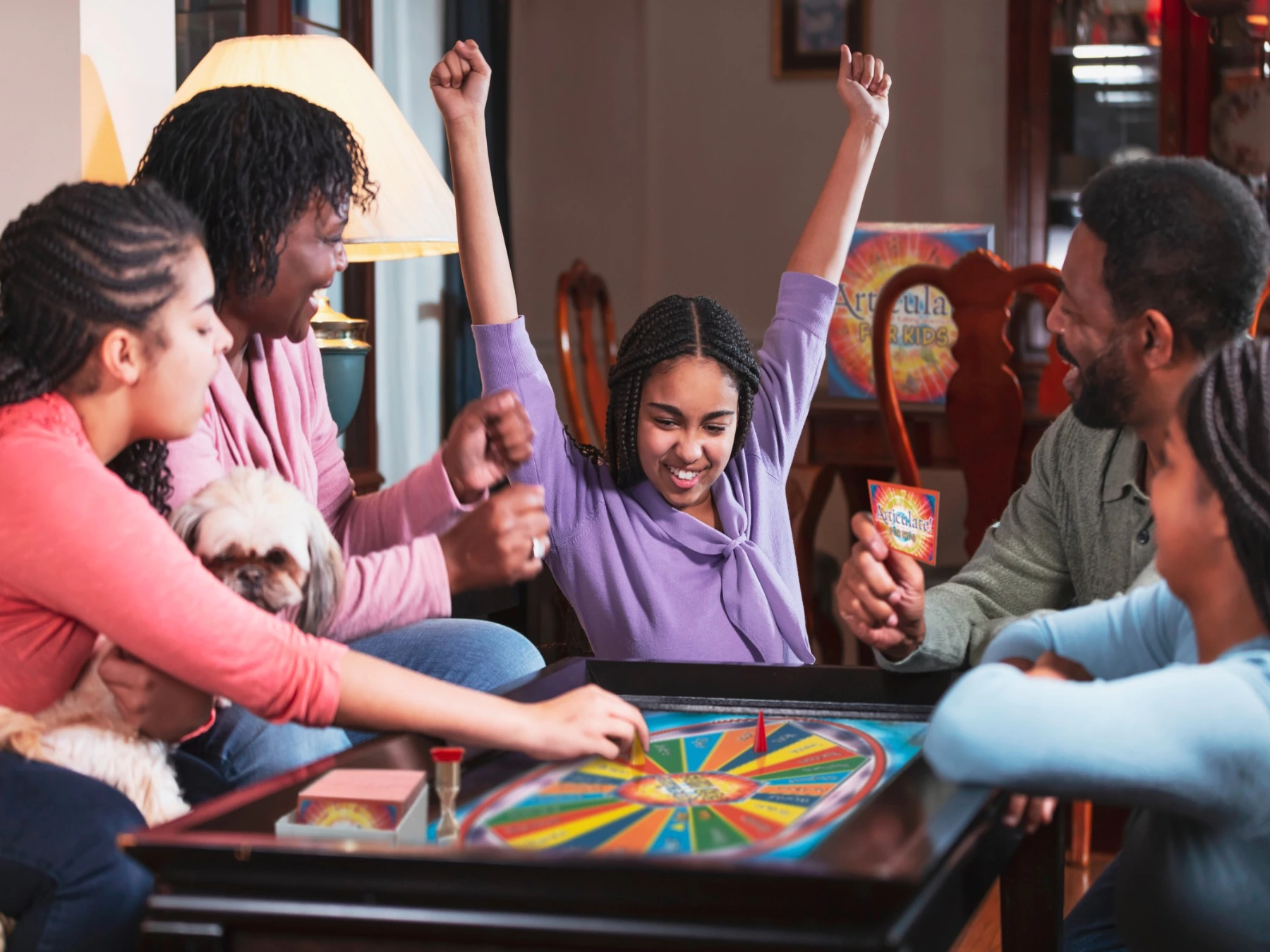 Family playing Articulate for Kids